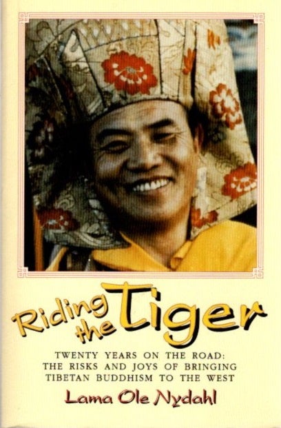 Item #24052 RIDING THE TIGER: Twenty Years on the Road: Risks and Joys of Bringing Tibetan Buddhism to the West. Lama Ole Nydahl.